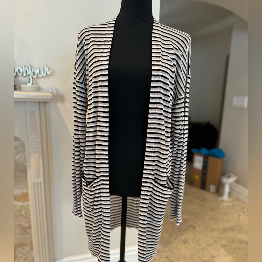 Never worn, striped sweater cardigan.